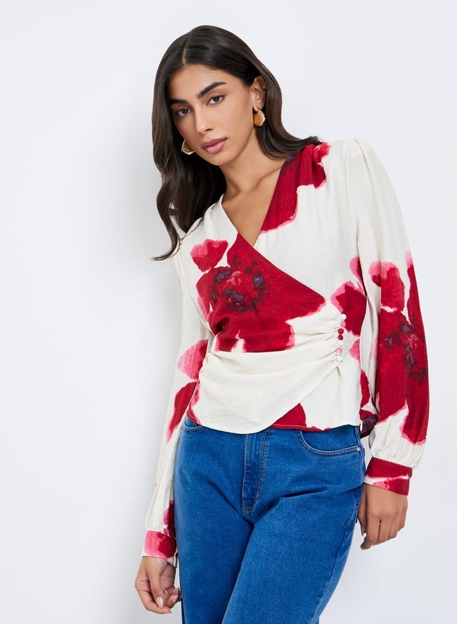 ستايلي بلوزة بطبعة زهور ونمط لف - Image 1